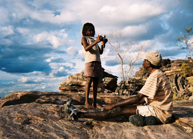 Child photographing an elder