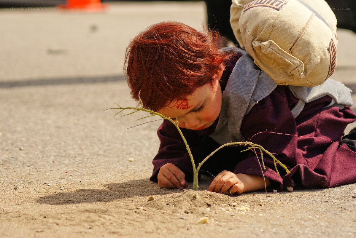 child planting a seed
