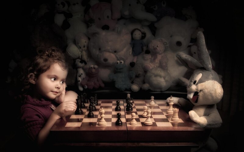 Child Playing Chess — Brown