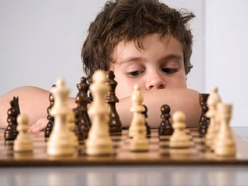 Child Playing Chess — White