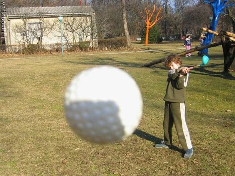 Child Playing Golf