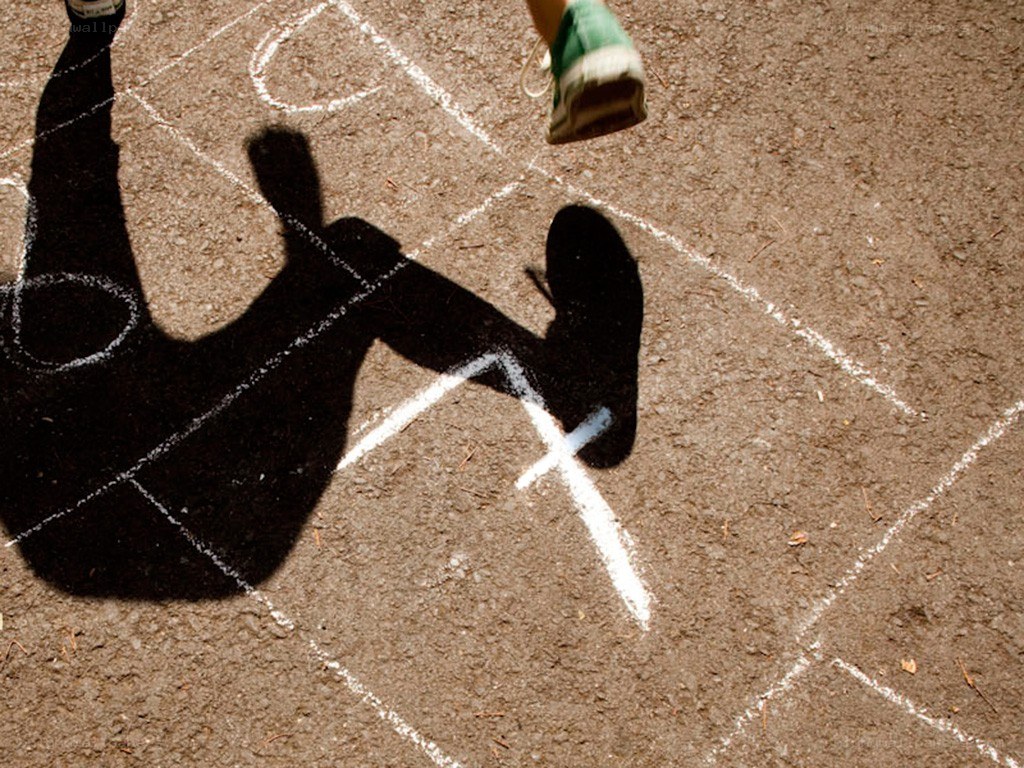 Child playing hopscotch