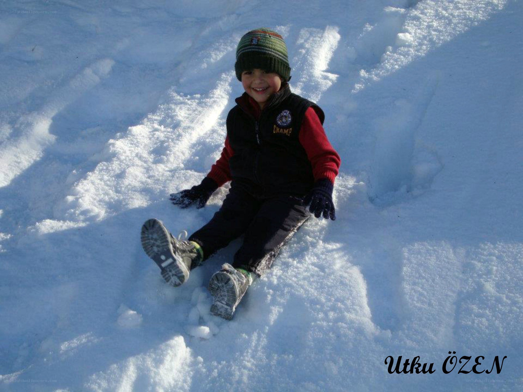 child playing in snow