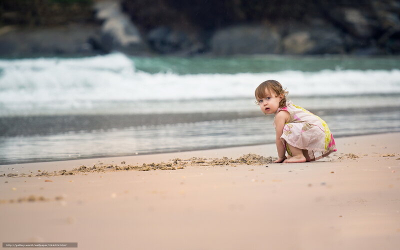 child playing on beach