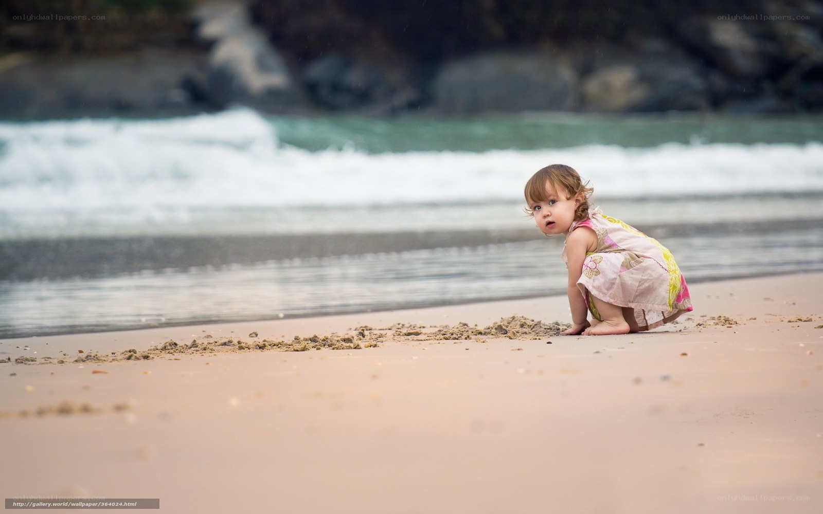 child playing on beach