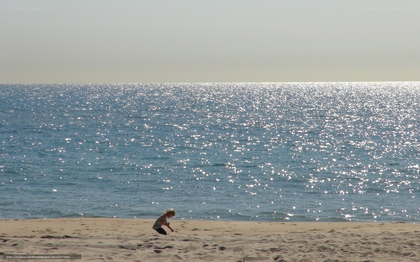 Child playing on the beach