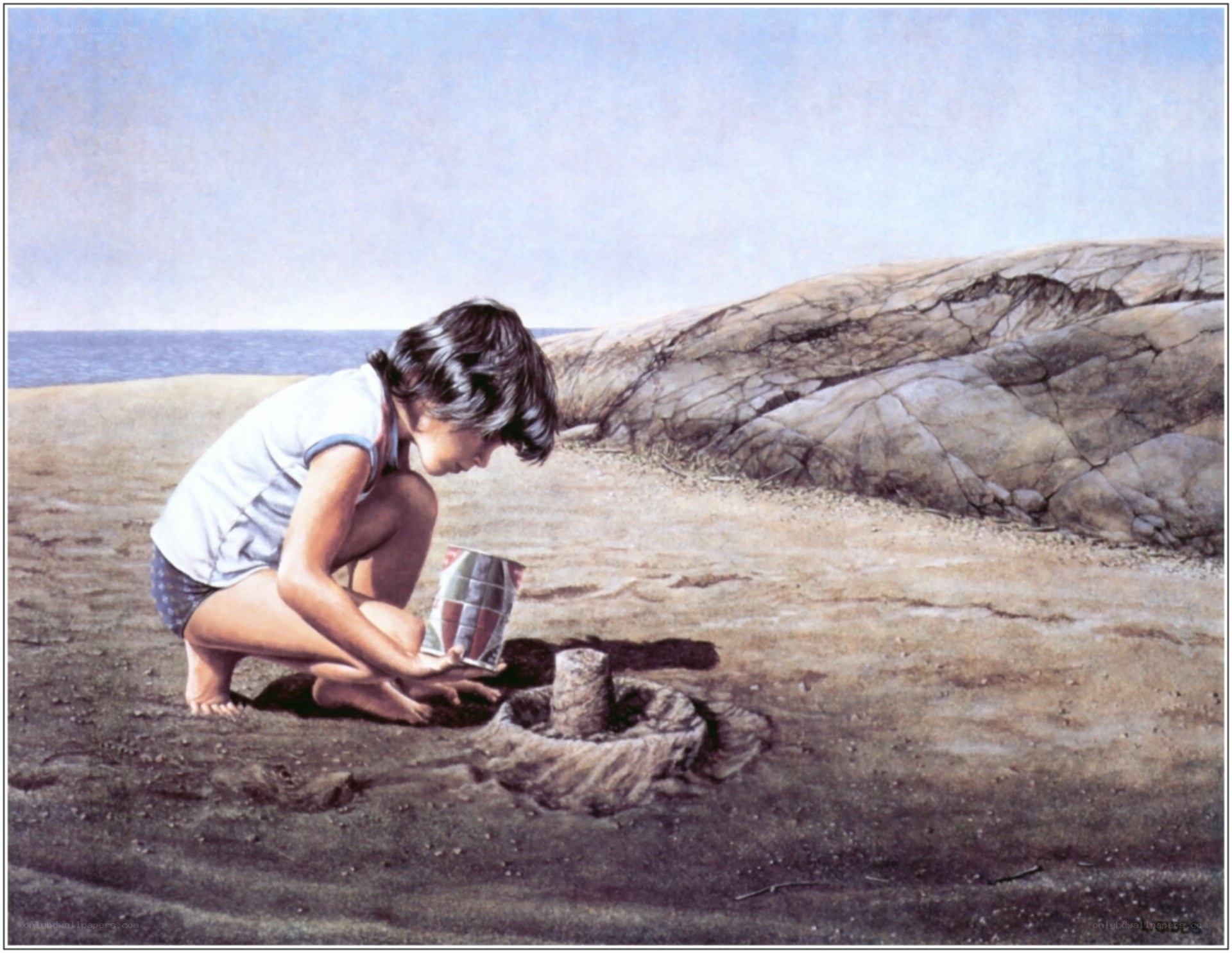 child playing on the beach