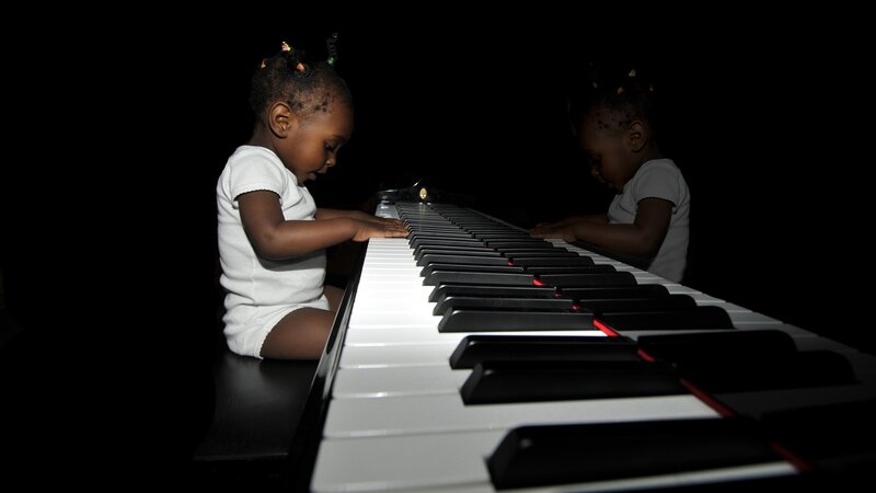 child playing piano