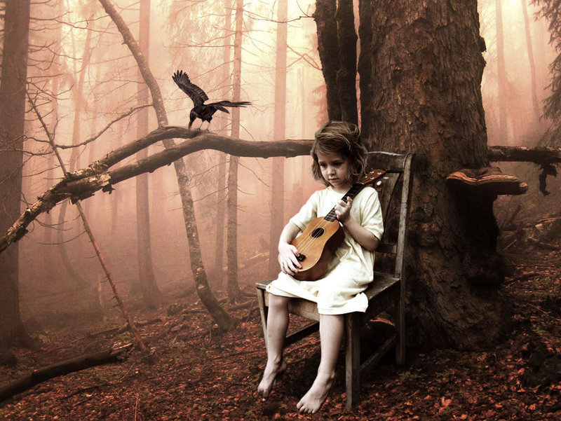 Child Playing Ukulele