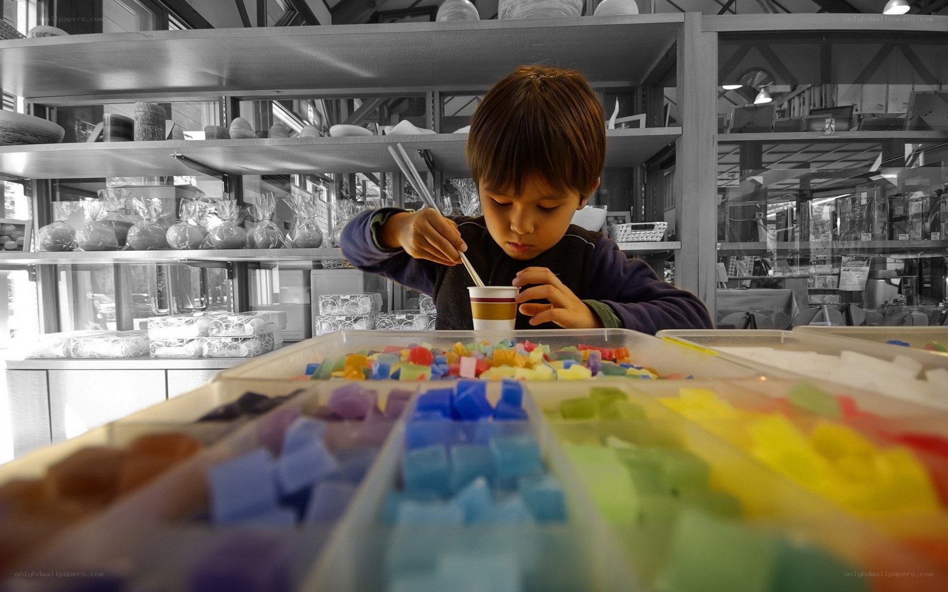 child playing with colorful blocks