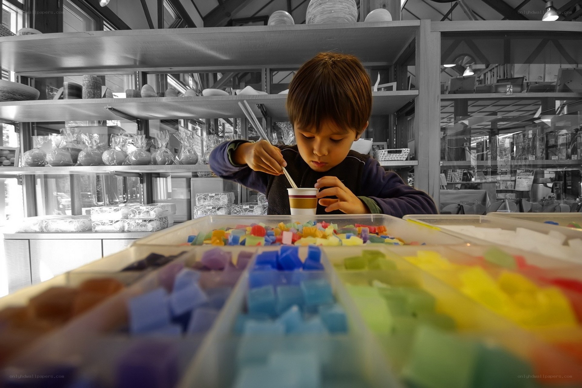 child playing with colorful blocks