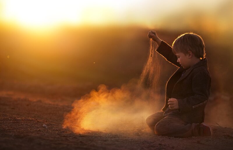 Child Playing with Sand — Gold