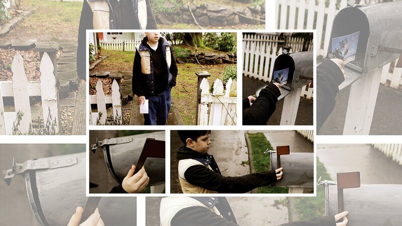 child posting a postcard