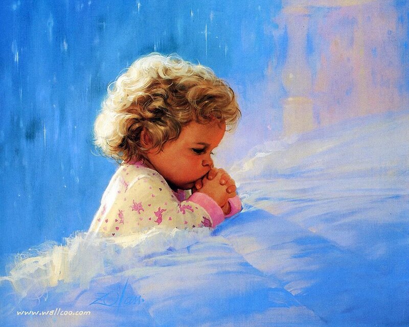 child praying in bed