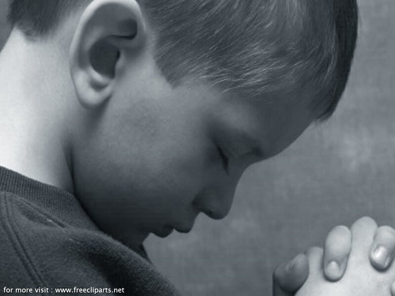 child praying in profile