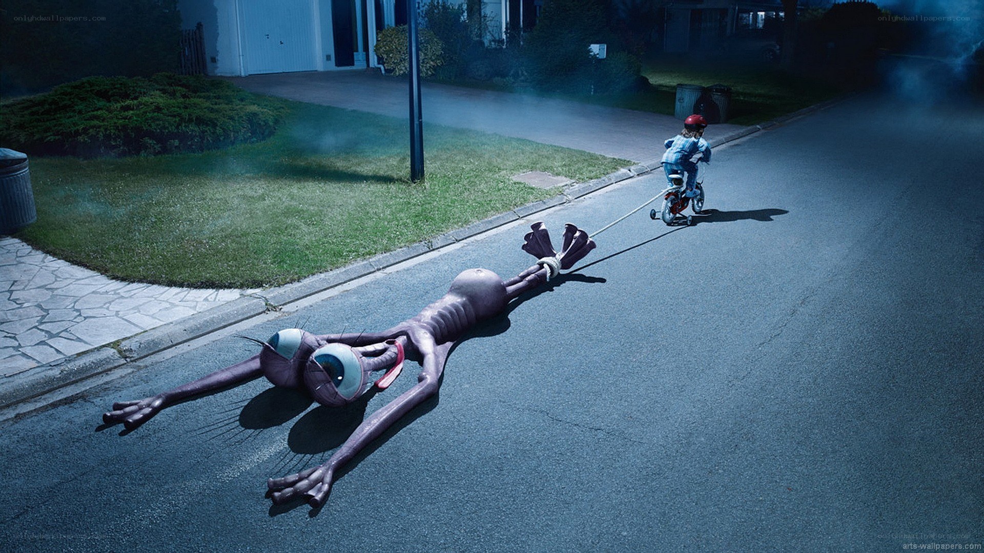 child pulling alien on street