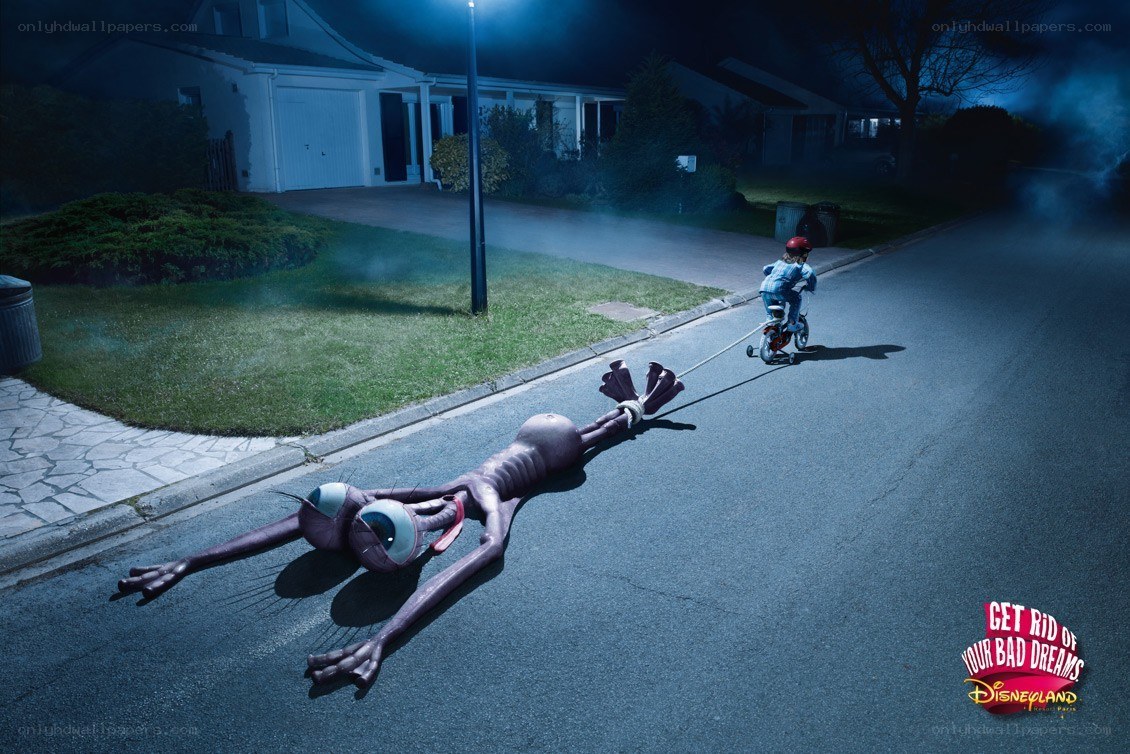 child pulling alien on street