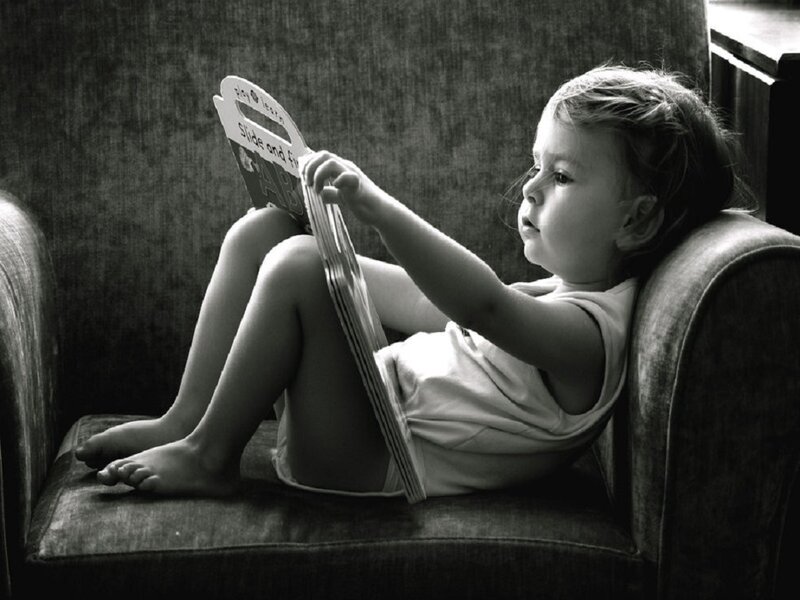 Child Reading Book — Black, Calm