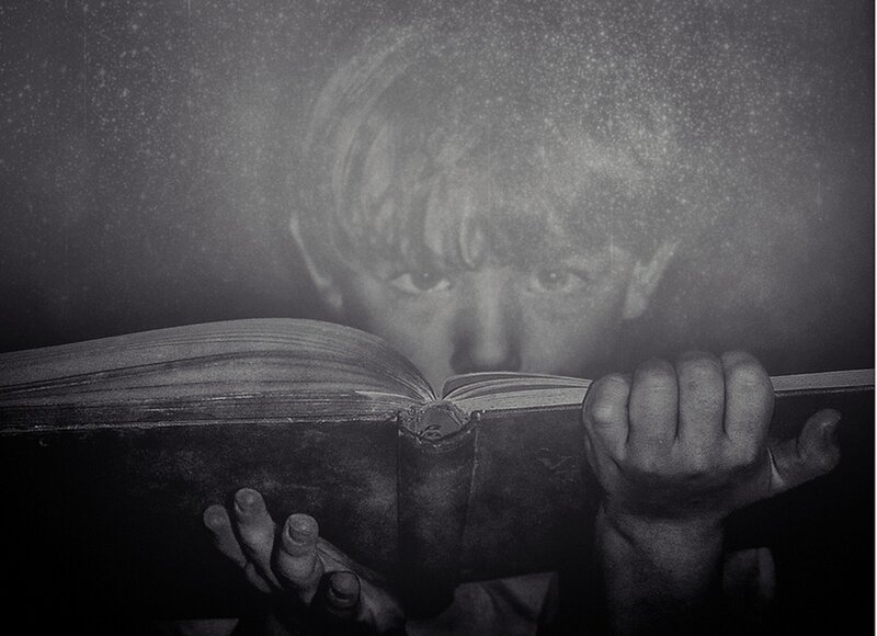 Child Reading Book — Black, Dramatic