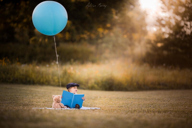 Child Reading Book — Blue, Serene, Sunset