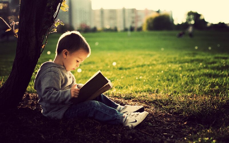 Child Reading Book — Green