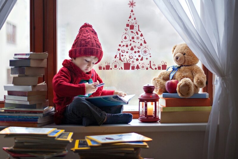 Child Reading by Window