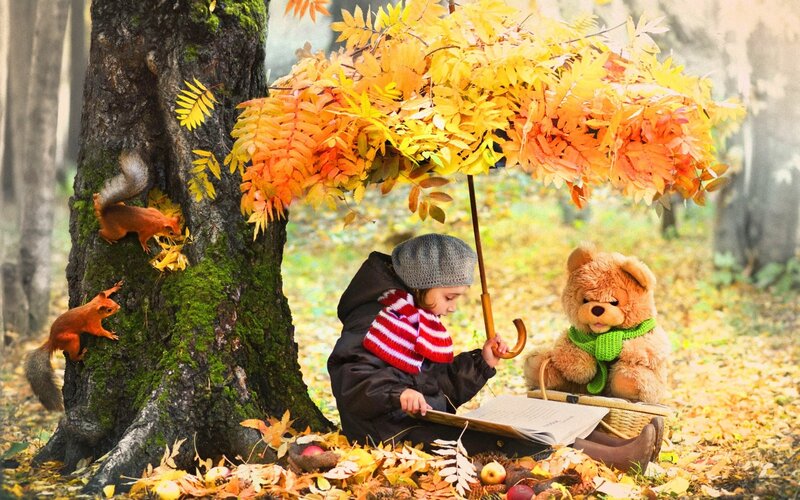 Child Reading with Teddy Bear