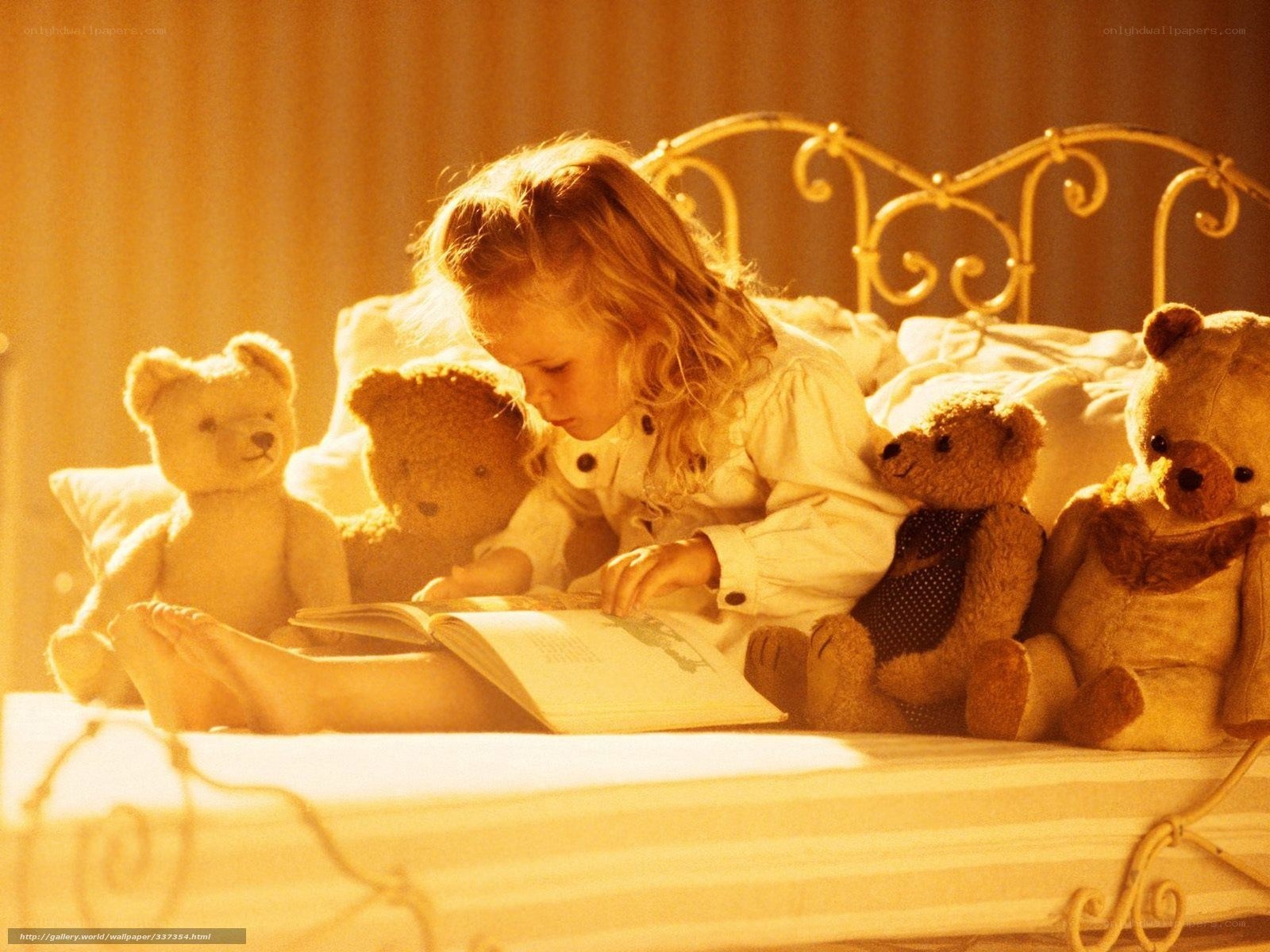 child reading with teddy bears