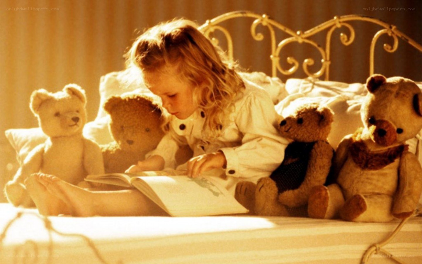 child reading with teddy bears