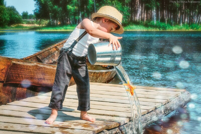 Child Releasing Fish