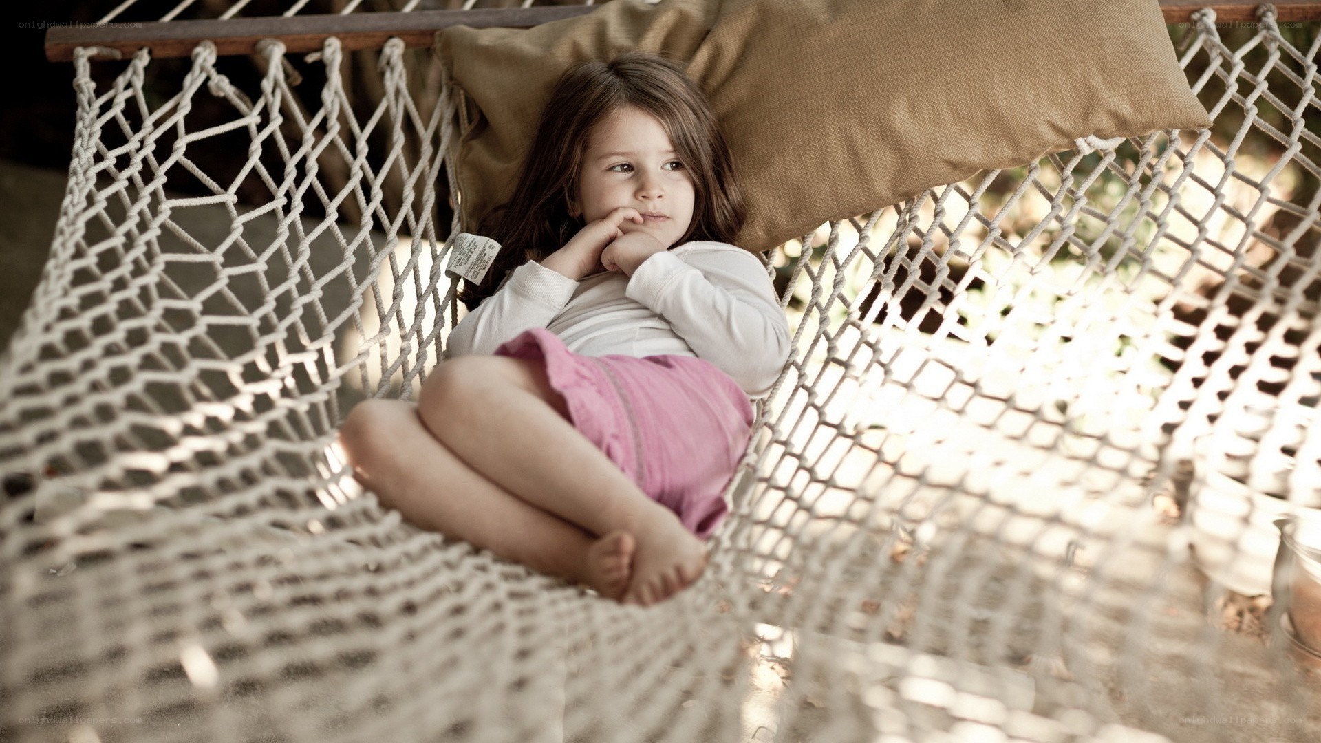 Child resting in a hammock