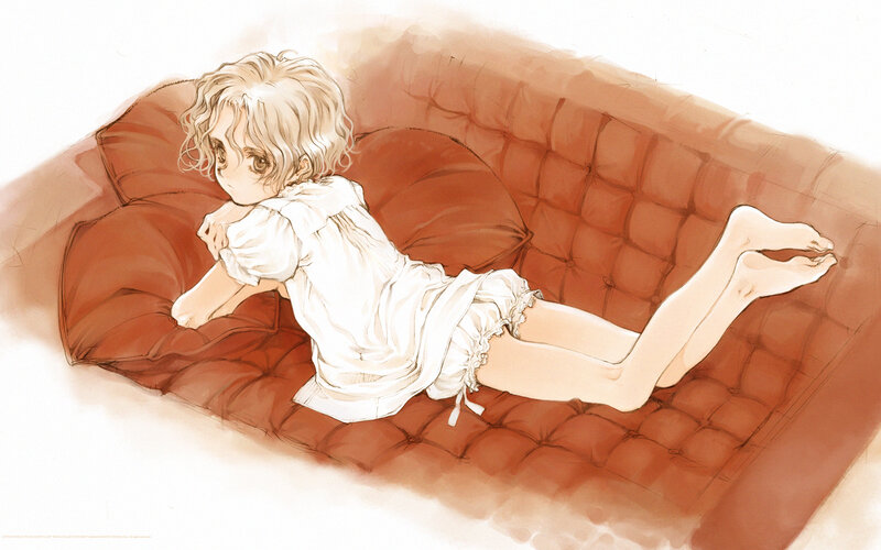 child resting on a sofa