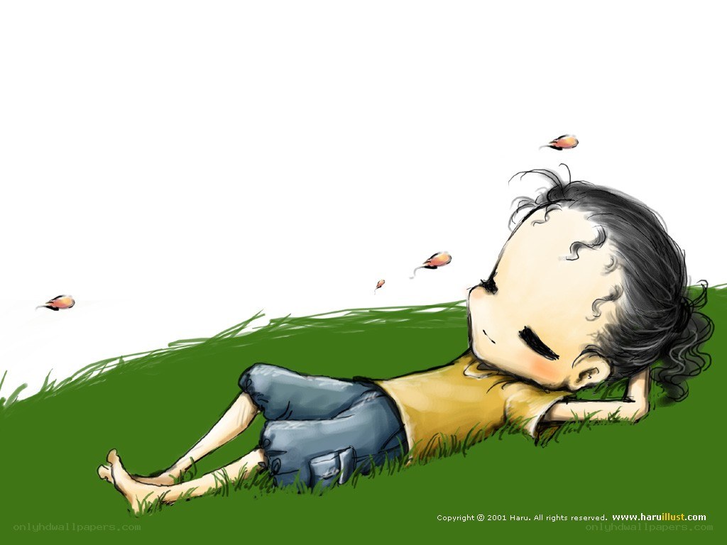 Child resting on grass