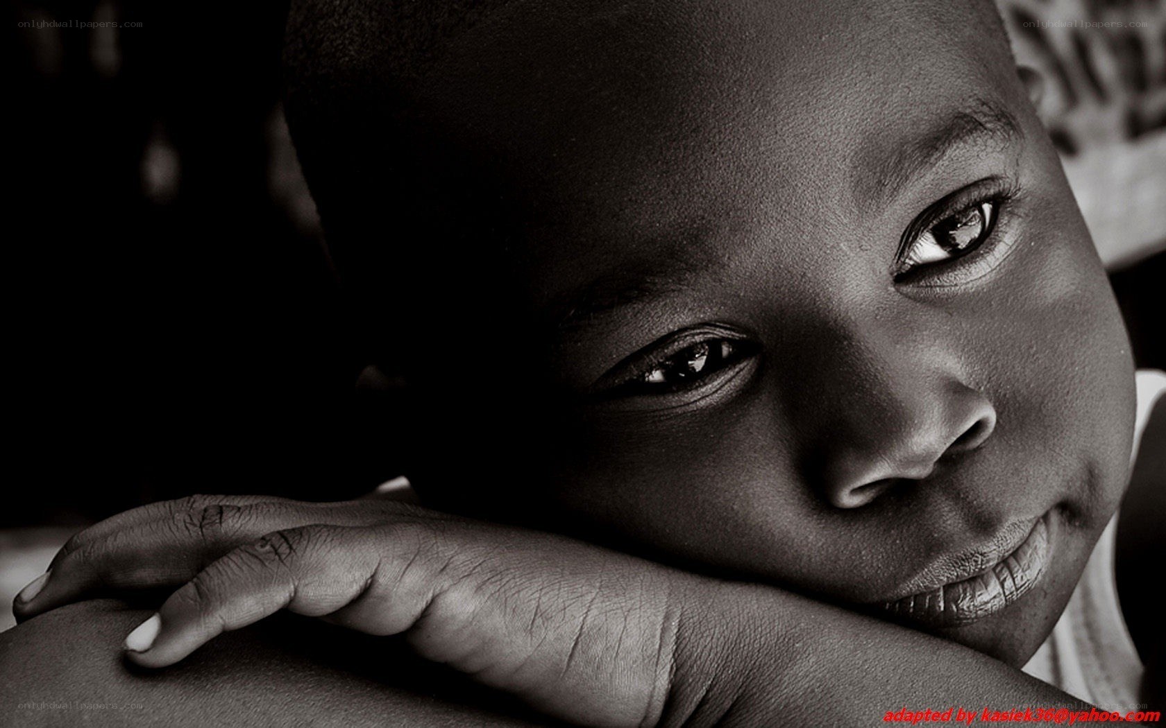 child resting on hands
