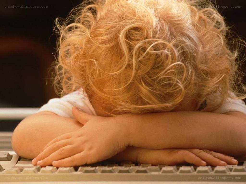 child resting on keyboard