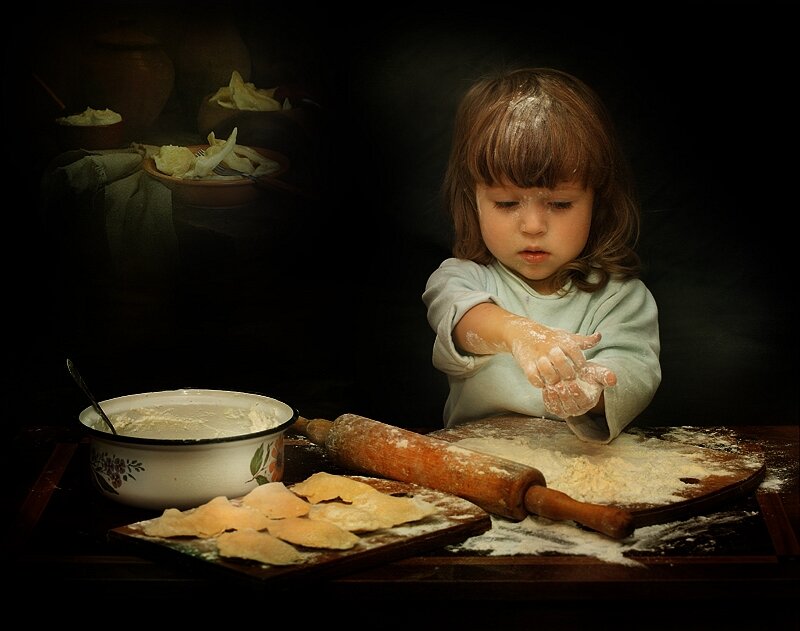 Child Rolling Dough