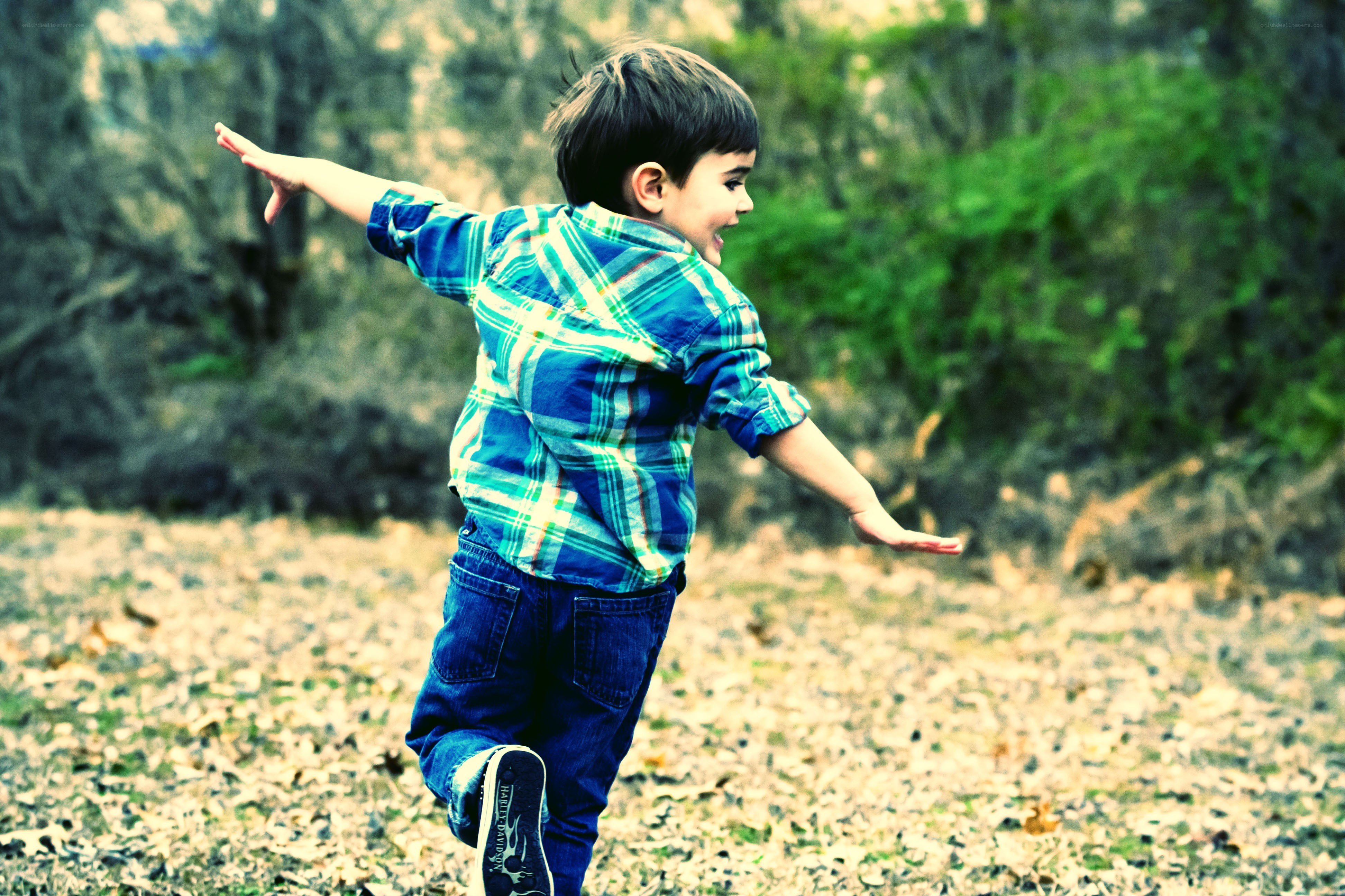 child running in a field