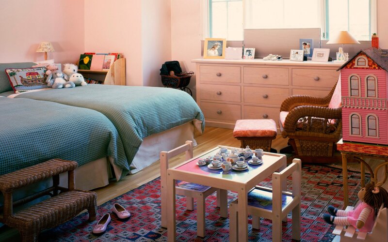 Child's bedroom with dollhouse