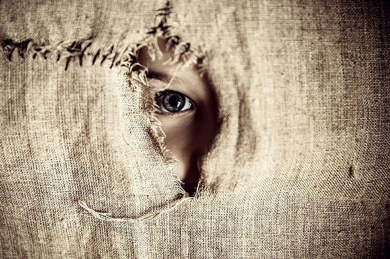 Child's Eye Through Fabric
