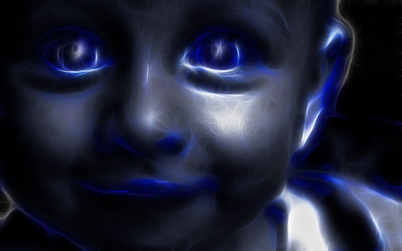 Child's Face with Glowing Eyes