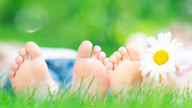 Child's Feet in Grass
