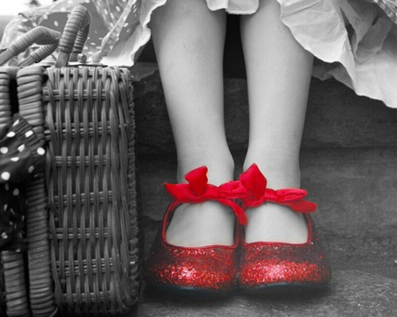 Child's Feet in Red Shoes