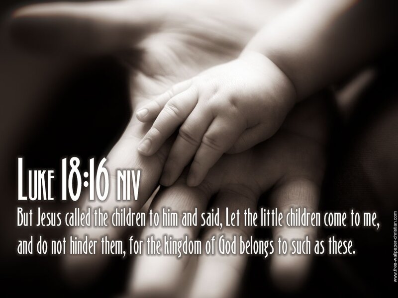 Child's Hand on Adult Hand