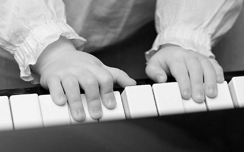 Child's Hands on Piano