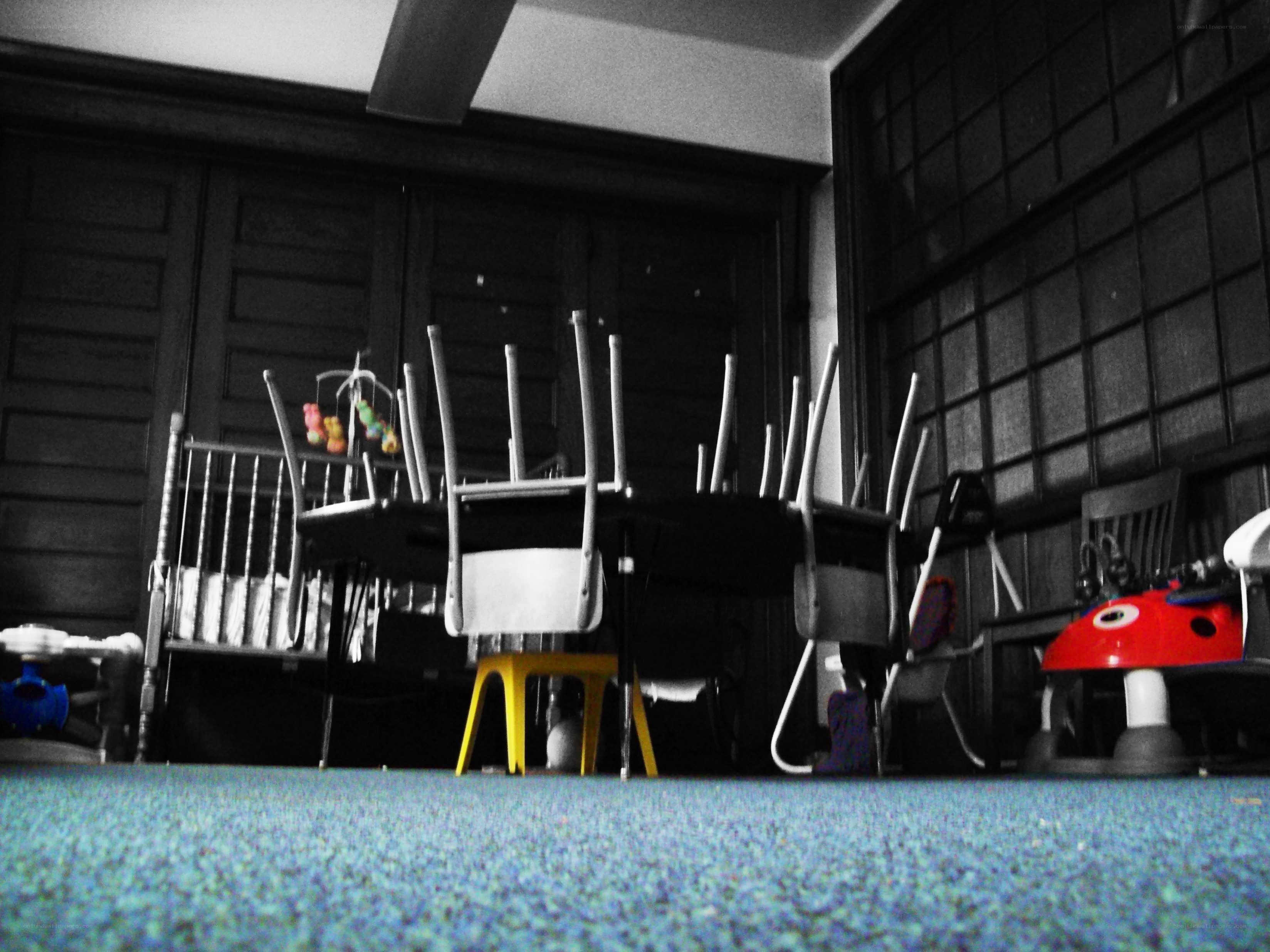 Child's room with overturned chairs