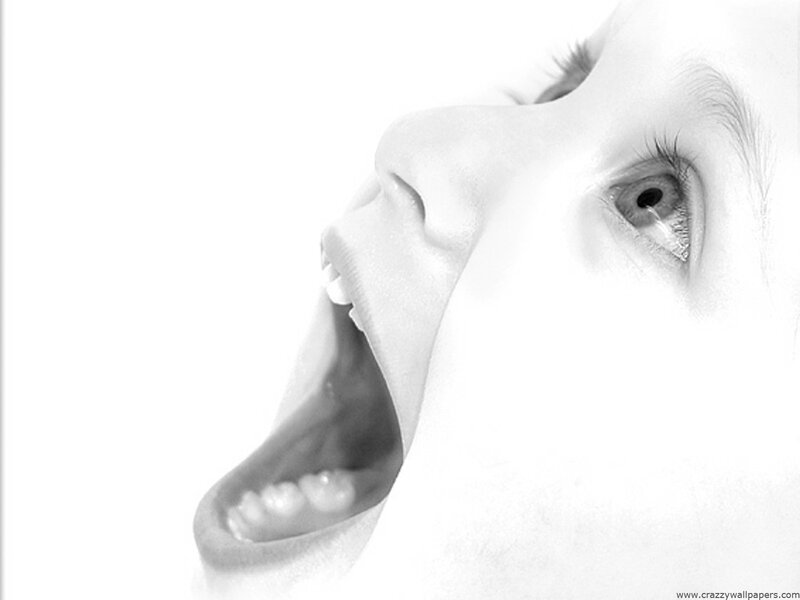 child screaming in black and white