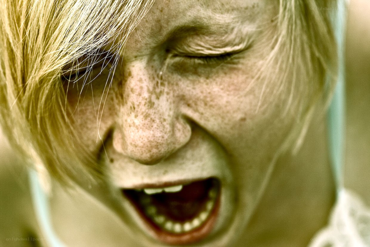 child screaming in distress