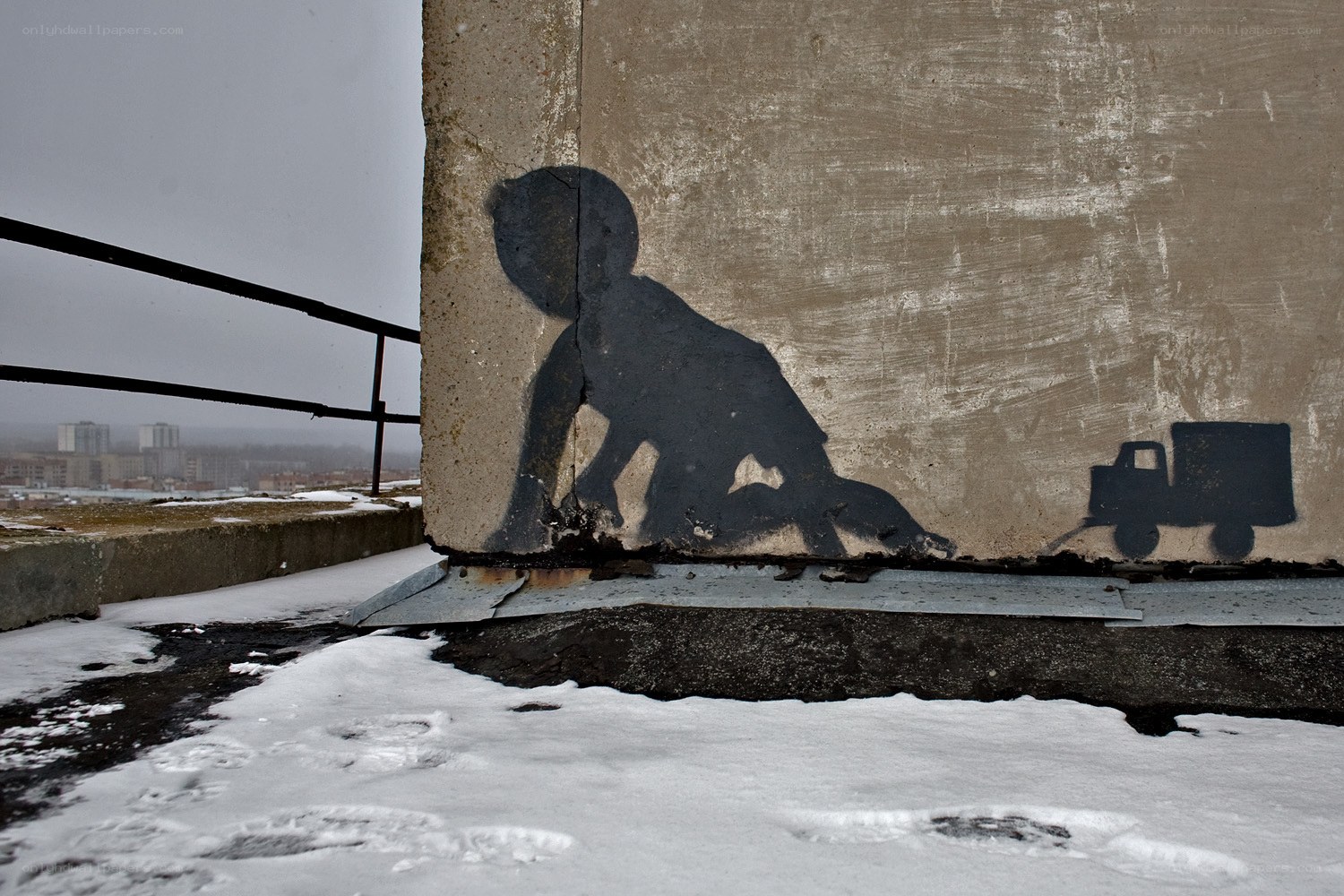 Child silhouette graffiti on wall