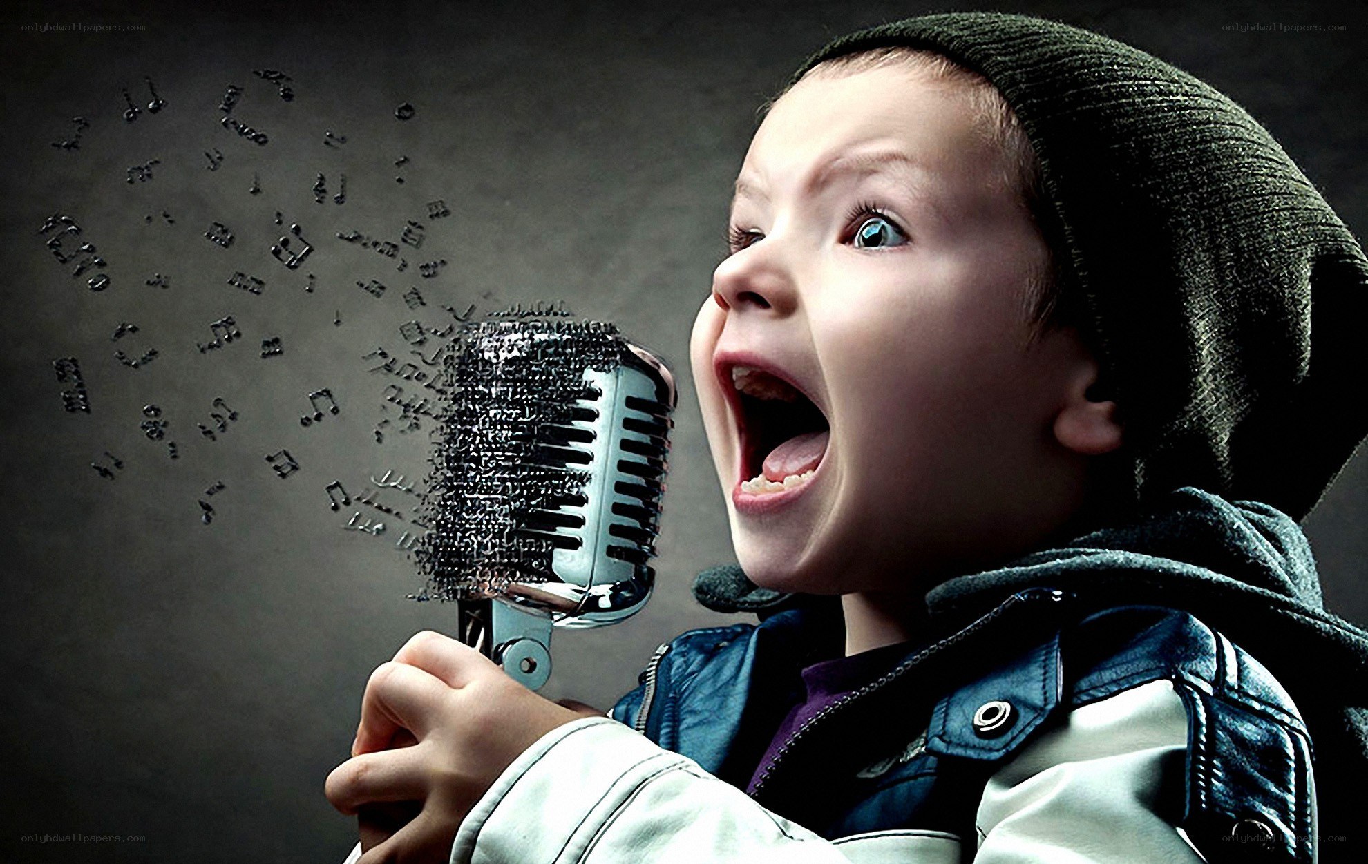 child singing into microphone
