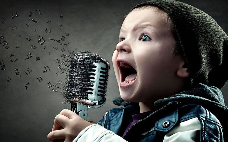 Child Singing into Microphone — Gray, Dramatic